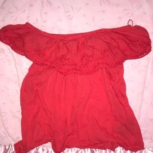 A red of the shoulders top